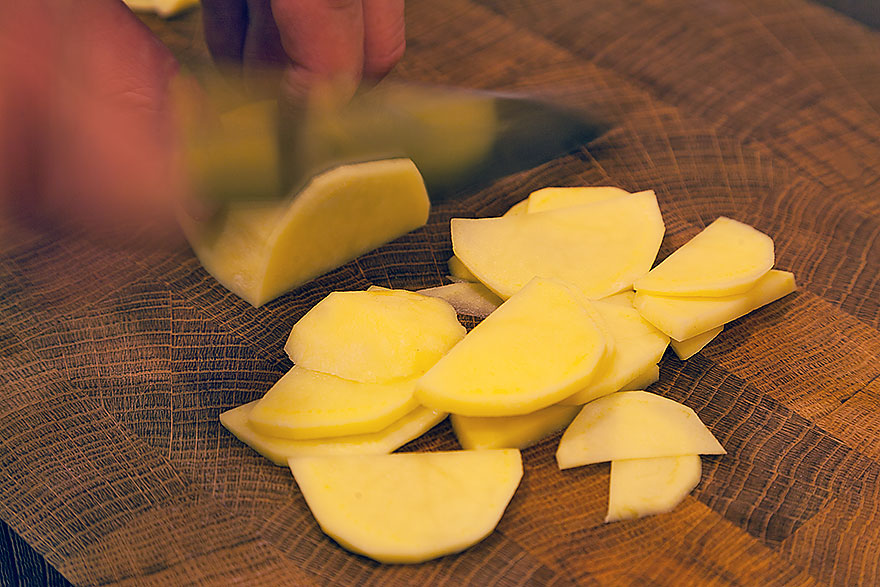 Slicing potatoes for Spanish omelette